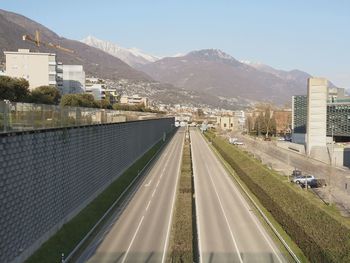 High angle view of road amidst buildings in city