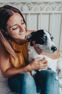Mid adult woman with dog