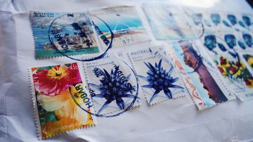 Close-up of vintage mail envelope with postage stamps