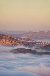 Aerial view of landscape against sky during sunset