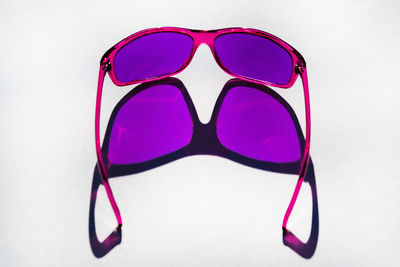 Close-up of sunglasses against white background