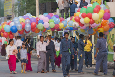 Rear view of people in traditional balloon