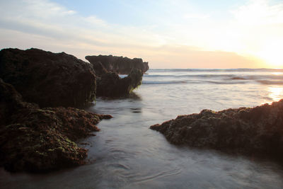 Scenic view of sea against sky during sunset