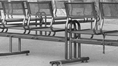 Empty chairs in the street 