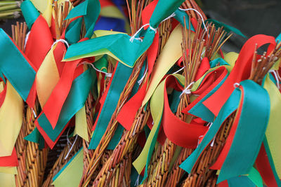 Close-up of multi colored flags for sale in market