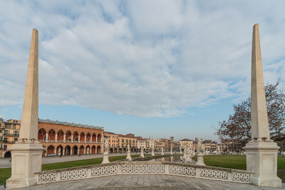 View of old building against cloudy sky