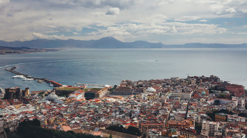 Cityscape with mountain range in background