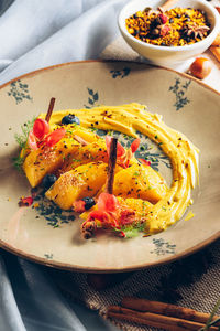 Close-up of food in plate on table