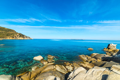 Scenic view of sea against blue sky