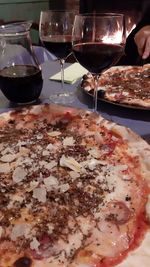 Close-up of pizza on table in restaurant