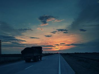 Road against sky during sunset