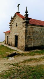 Low angle view of historic building against sky