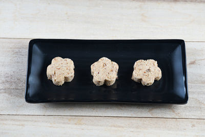 High angle view of cookies on table