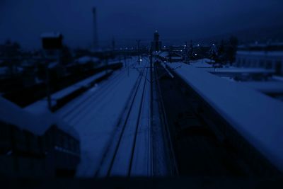 Railroad tracks at night