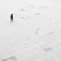 High angle view of person walking on street