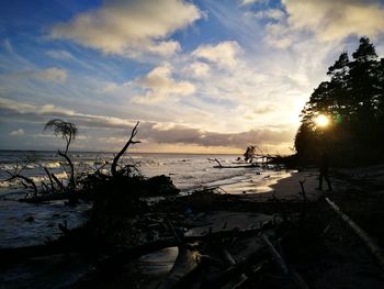 Scenic view of sea against sky at sunset