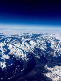 Aerial view of snow covered landscape