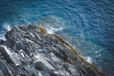 Aerial view of rock formation in sea