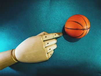 Close-up of hand holding ball