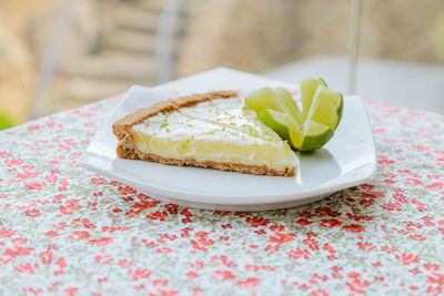 Close-up of cake served on table
