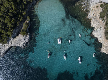 High angle view of rocks in sea