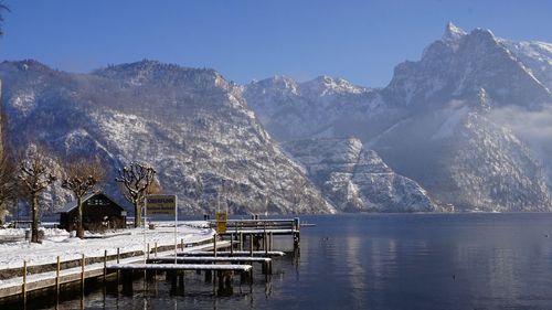 Scenic view of snow covered mountains against sky