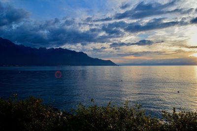 Scenic view of sea against sky at sunset