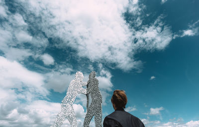 Low angle view of statue against sky