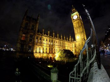 View of illuminated clock tower at night