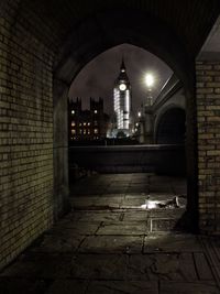 Illuminated building in city at night