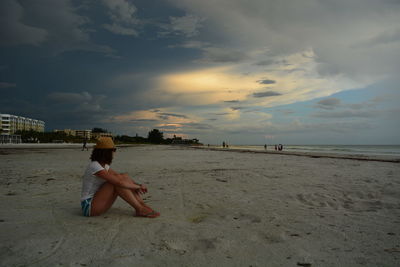 Woman standing on beach