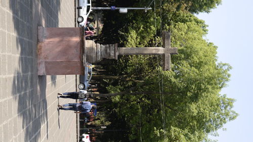 People on road in city