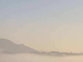 Scenic view of mountains against sky during sunset