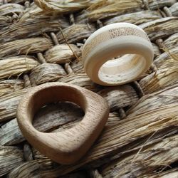 High angle view of wooden rings on thatched surface