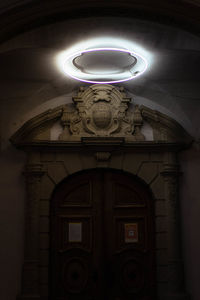 Low angle view of illuminated building at night