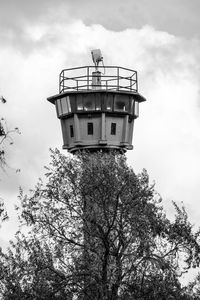 Low angle view of water tower against sky