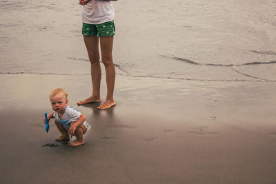 Little boy playing on the beach