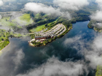 High angle view of town against cloudy sky