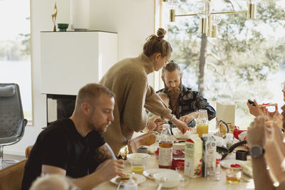 Group of friends eating breakfast