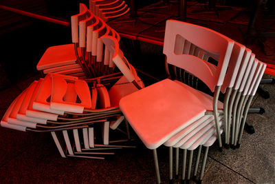 High angle view of empty chairs and tables