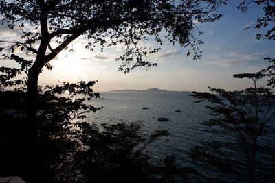 Scenic view of sea against sky at sunset