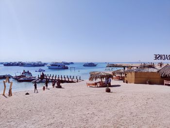 Scenic view of beach against clear sky