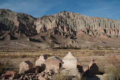 Cemetery against rocky mountains