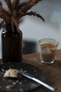 Close-up of coffee in glass on table