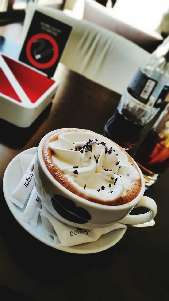 food and drink, indoors, table, sweet food, food, still life, freshness, plate, dessert, ready-to-eat, unhealthy eating, indulgence, close-up, cake, coffee cup, serving size, focus on foreground, refreshment, high angle view, breakfast