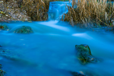 View of waterfall in sea