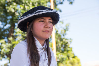 Portrait of beautiful argentinian girl wearing traditional clothes