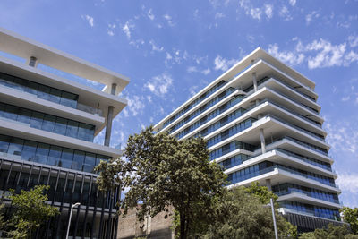 Low angle view of modern building against sky