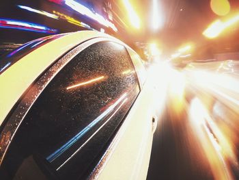 Close-up of illuminated light trails at night