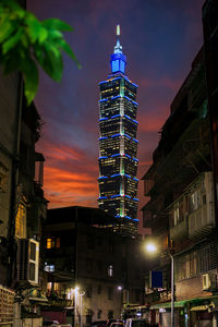 Low angle view of illuminated buildings at night